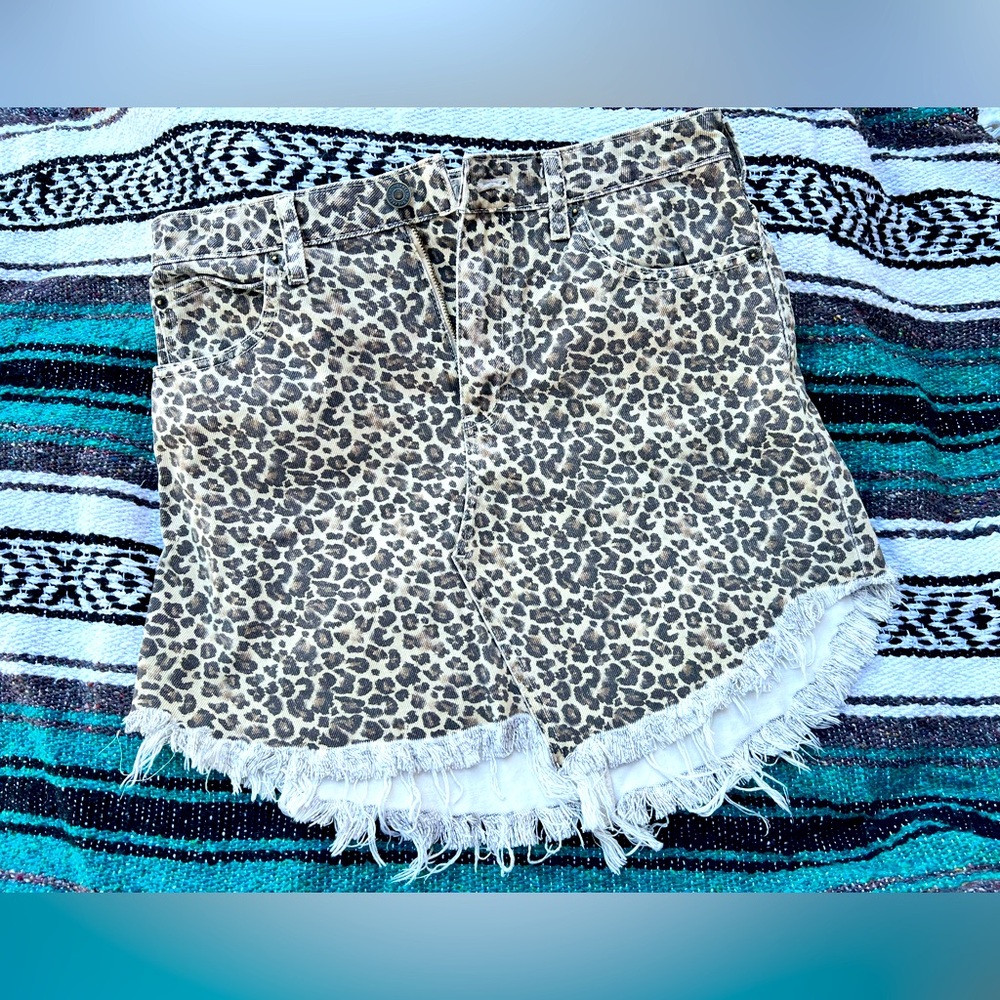 ‘We the Free” Leopard Print Denim Skirt, Frayed and 100% cotton, size 28